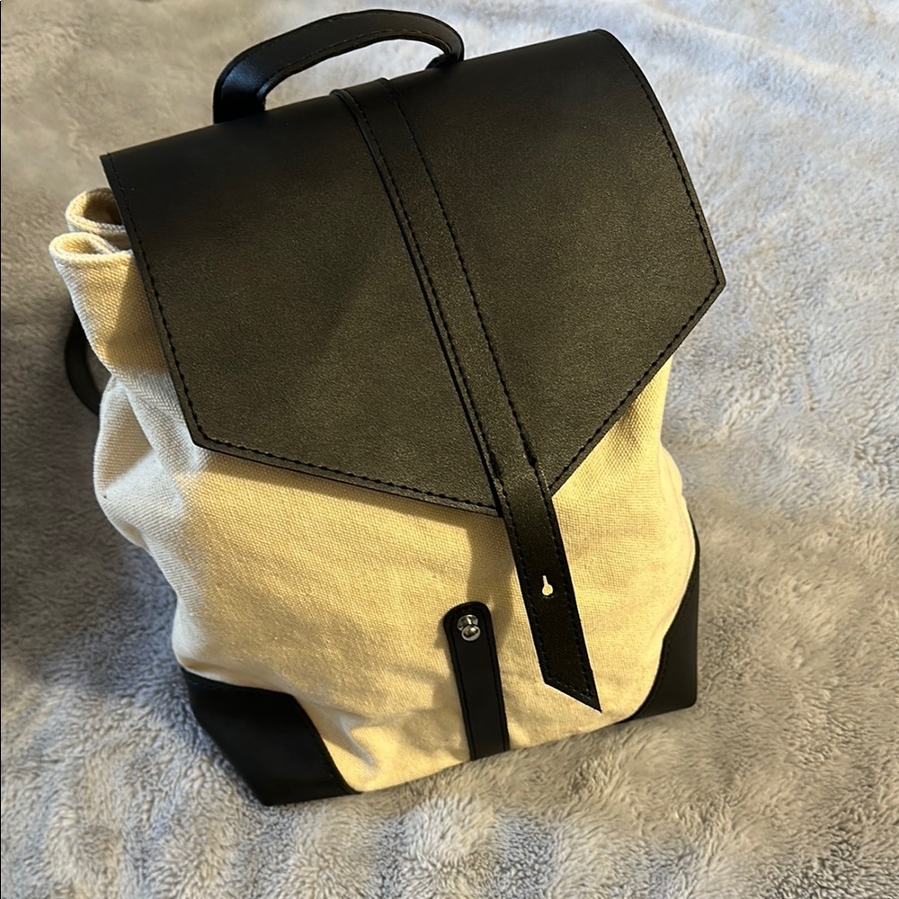 Lightly used backpack purse leather like trim